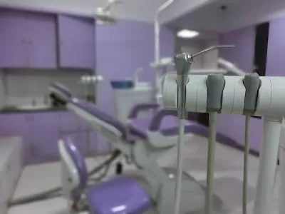 Lakshmi Roots Dental Hospital and Implant Centre- Dr Suganesh BEST DENTIST VILLIVAKKAM